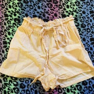 Yellow woven shorts in size S